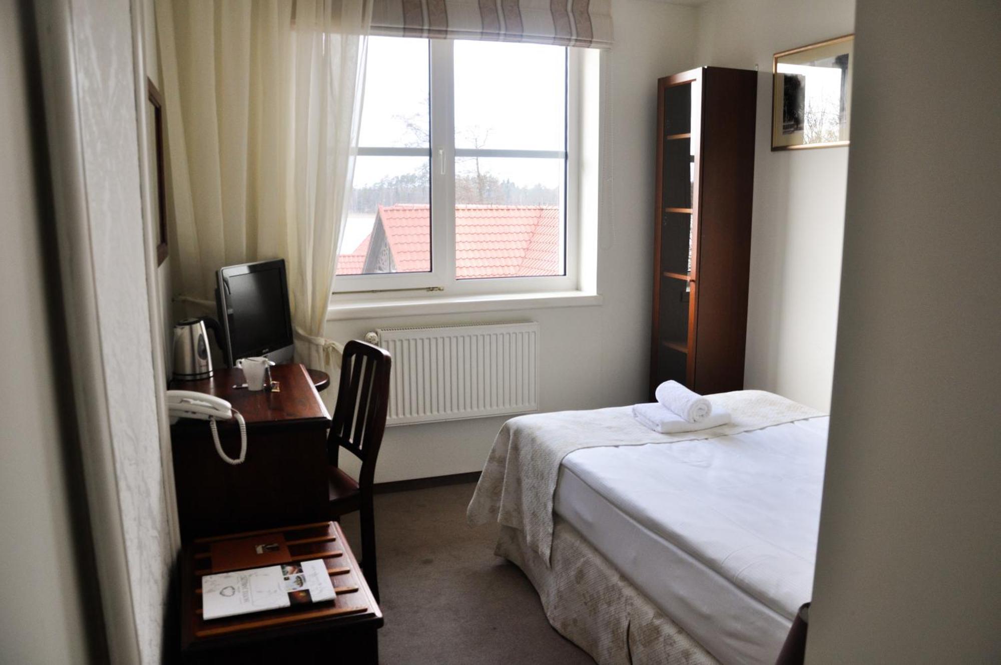 Jablon Lake Resort Pisz Habitación foto